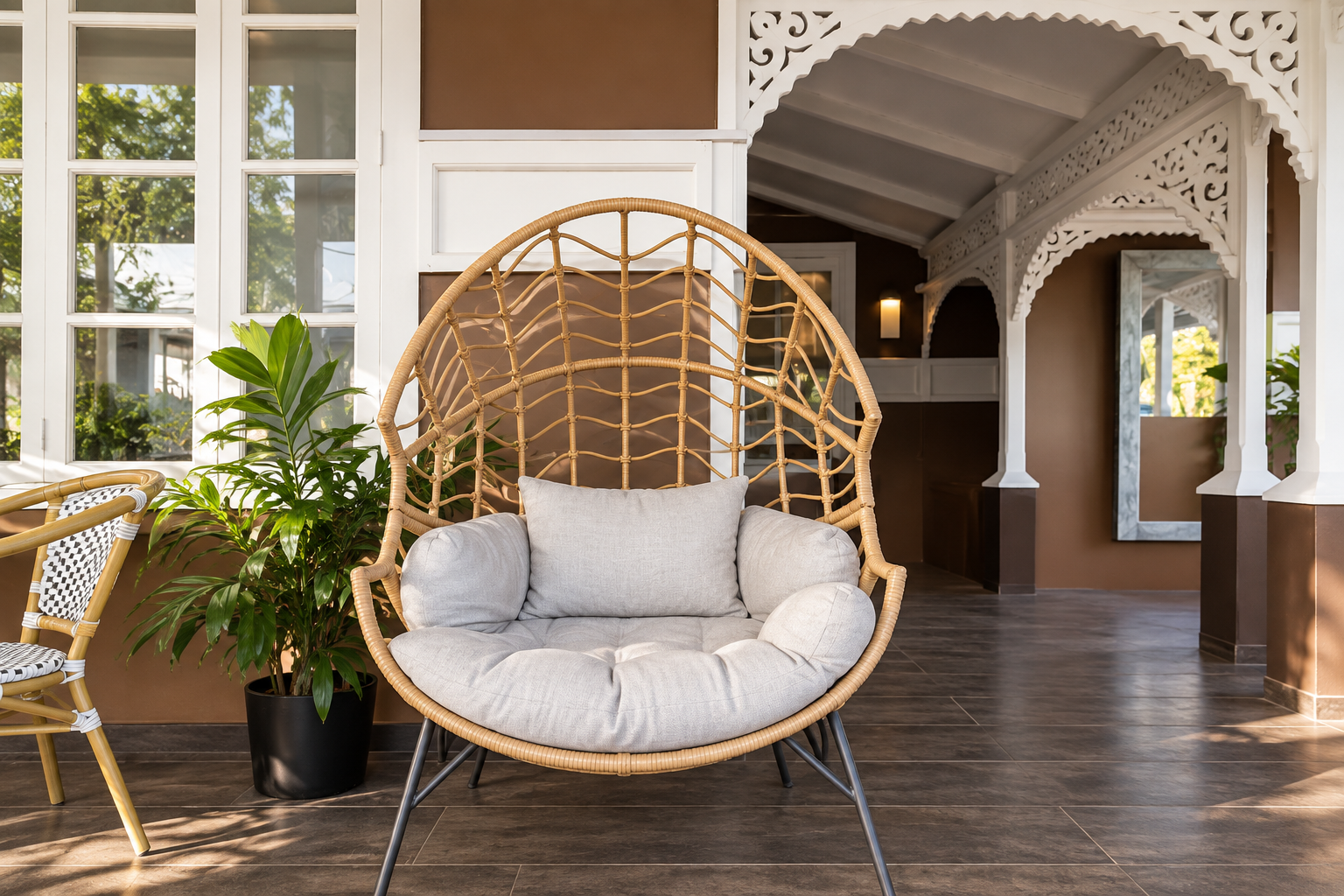Rendered preview of the Carlos Street café seating nook, with a woven chair and white gingerbread trim